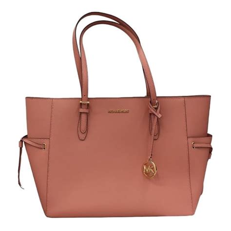 jet set top zip tote.